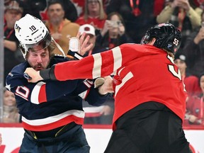 J.T. Miller and Colton Parayko fight