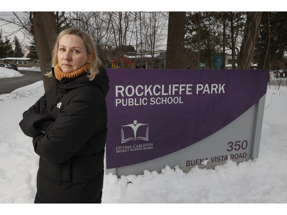  tara doherty poses for a photo in front of rockcliffe park public school in ottawa monday. tara and many other families are part of a group that is concerned about an announcement to be released on feb. 28 that will tell parents all over the city how school boundaries have changed. under the elementary school review, more children will be attending their neighbourhood school. in this case, they fear their children will be shifted to york street public school.