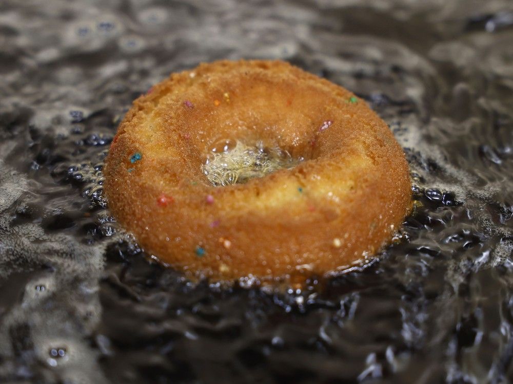  a suzyq doughnut frying.