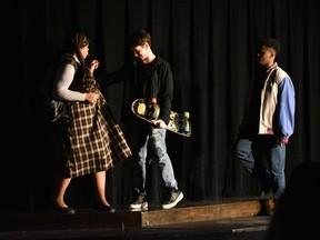 Carrie played by Madison Washington (L), Billy played by Thomas Cleveland(2nd L), and Tommy played by Rayan Moussa(R) during Sir Wilfrid Laurier's production of Carrie, on February 27th, 2025.