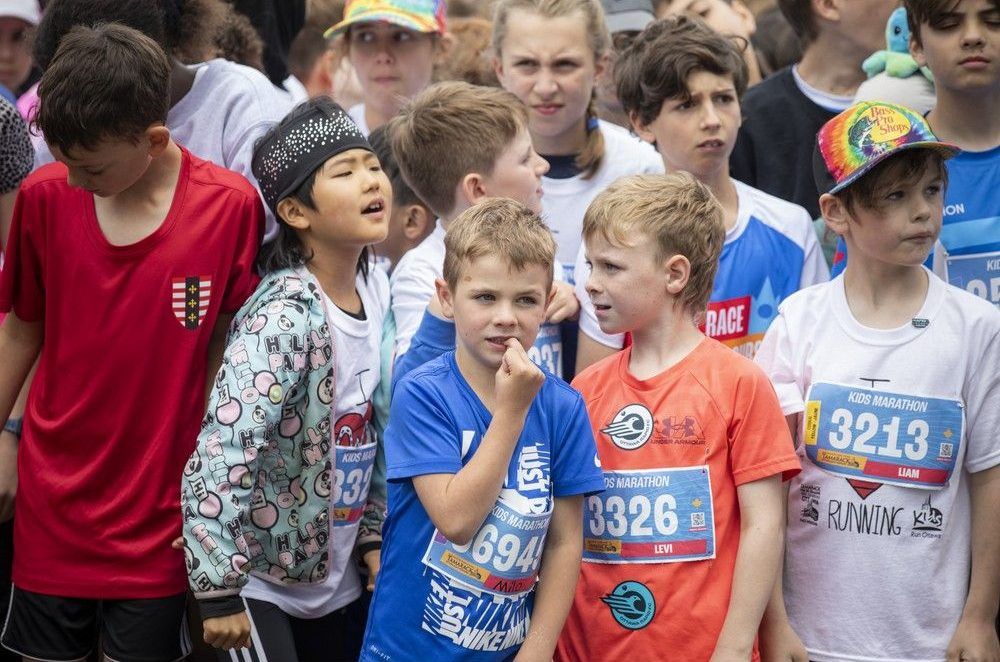  Wide-eyed and full of energy, kids ages 5 to 12 hit the pavement Saturday for the sold-out Ottawa Kids Marathon, a 1.2-kilometre dash.