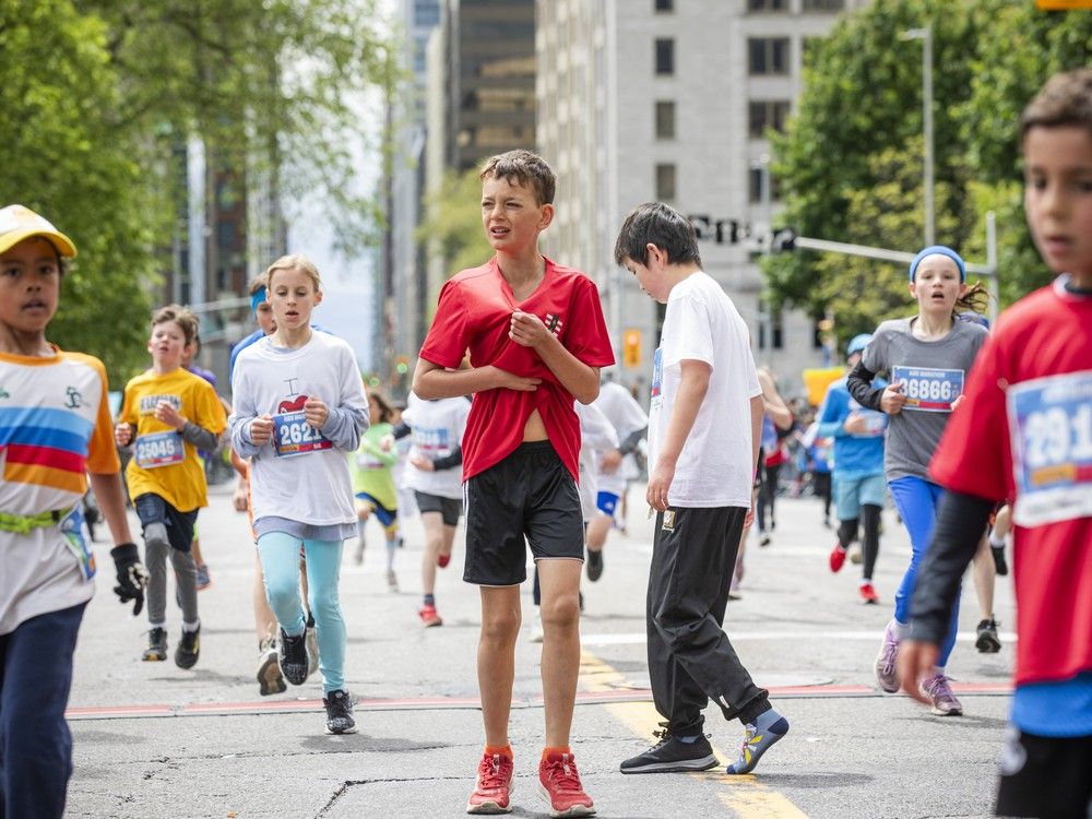  Wide-eyed and full of energy, kids ages 5-12 hit the pavement Saturday for the Ottawa Kids Marathon.