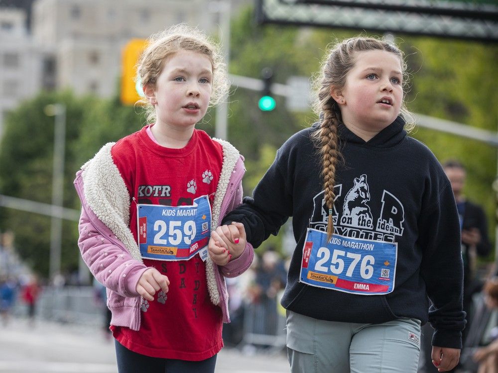  Wide-eyed and full of energy, children 5-12 hit the pavement Saturday for the 1.2-kilometre Ottawa Kids Marathon.