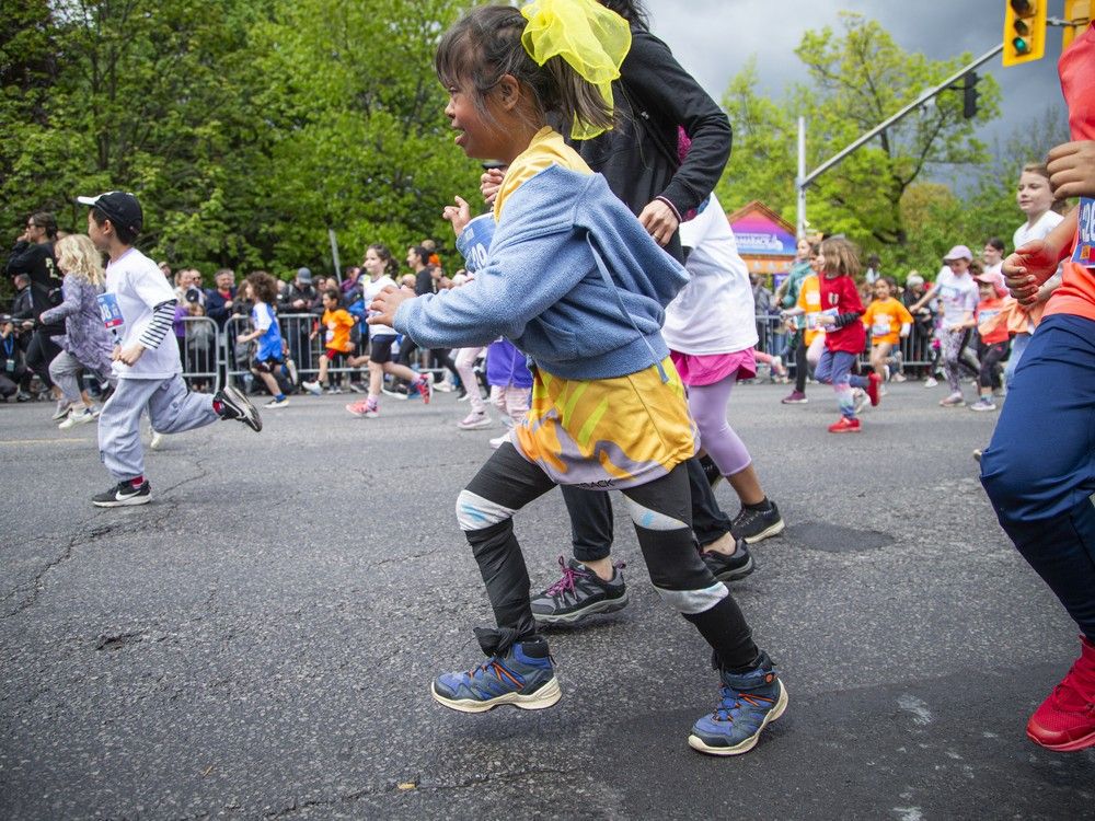  Sophie Diaz was all smiles as she took part in the Kids Marathon on Saturday.