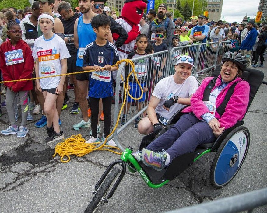  Families, first-timers, and young runners — joined by Amy Scott, who wheeled up to the start line — came together Saturday for the Ottawa 2K.