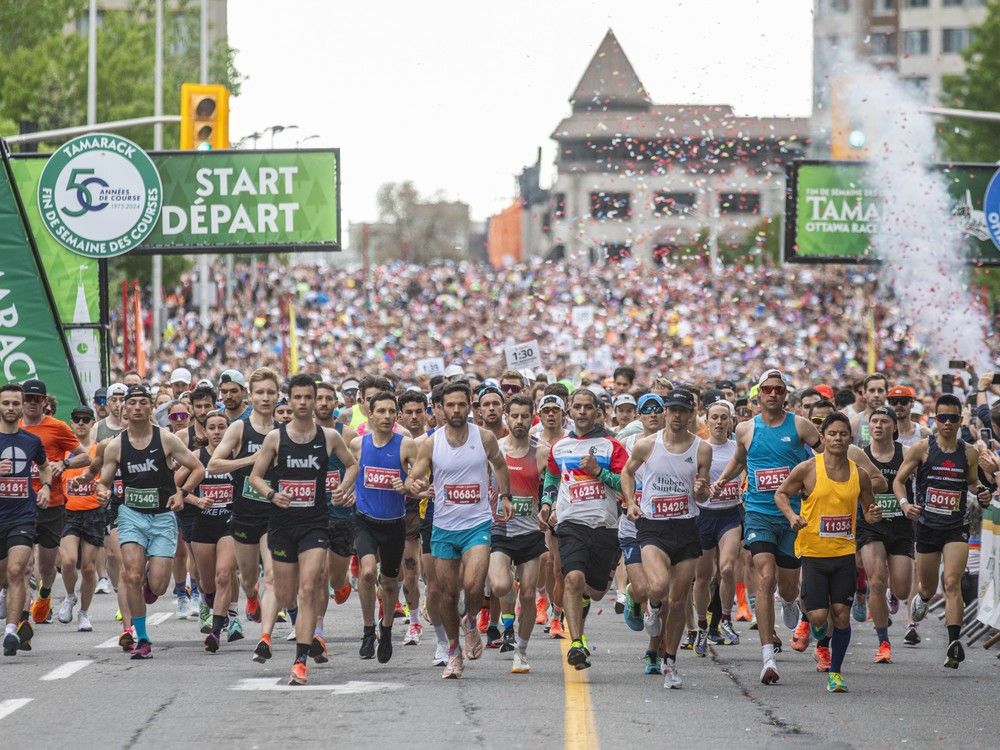  Runners cross the start line of the Ottawa Half Marathon presented by Desjardins at Tamarack Ottawa Race Weekend Sunday, May 26, 2024.
