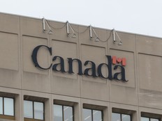 The Canada wordmark sits on government buildings.