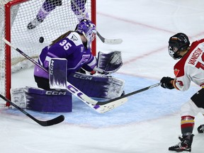 Tereza Vaniová of the Ottawa Charge scores a goal on Maddie Rooney of the Minnesota Frost during the third period at Xcel Energy Center on May 26, 2025 in St Paul.