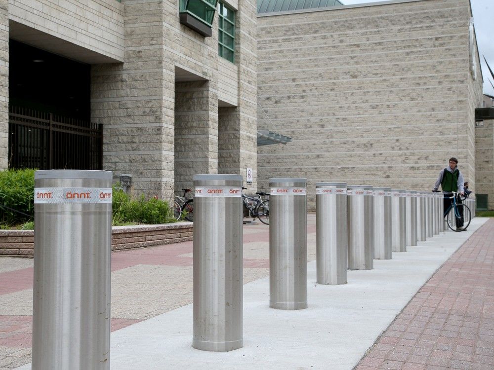  Bollards now stretch across the entrance to Ottawa City Hall as a security measure.Also, new security equipment was being installed at the main entrance of Ottawa City Hall May 21st as well as the city will soon x-ray bags and put people through metal detectors before they’re allowed into city hall.