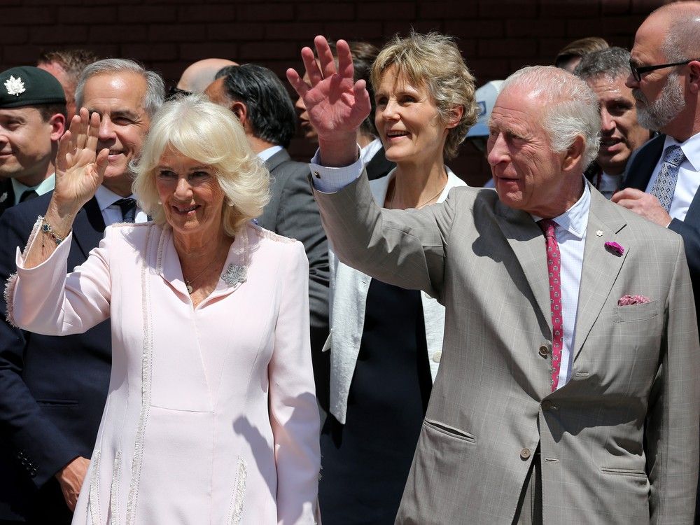  King Charles and Queen Camilla, escorted by Prime Minister Mark Carney and his wife Diana Fox Carney (rear), stopped by Lansdowne Park in Ottawa Monday.