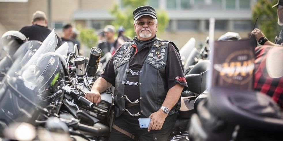  Lothar Bachmann, a Ride for Dad veteran since its rainy first event in 2000, sports a leather vest covered in buttons.