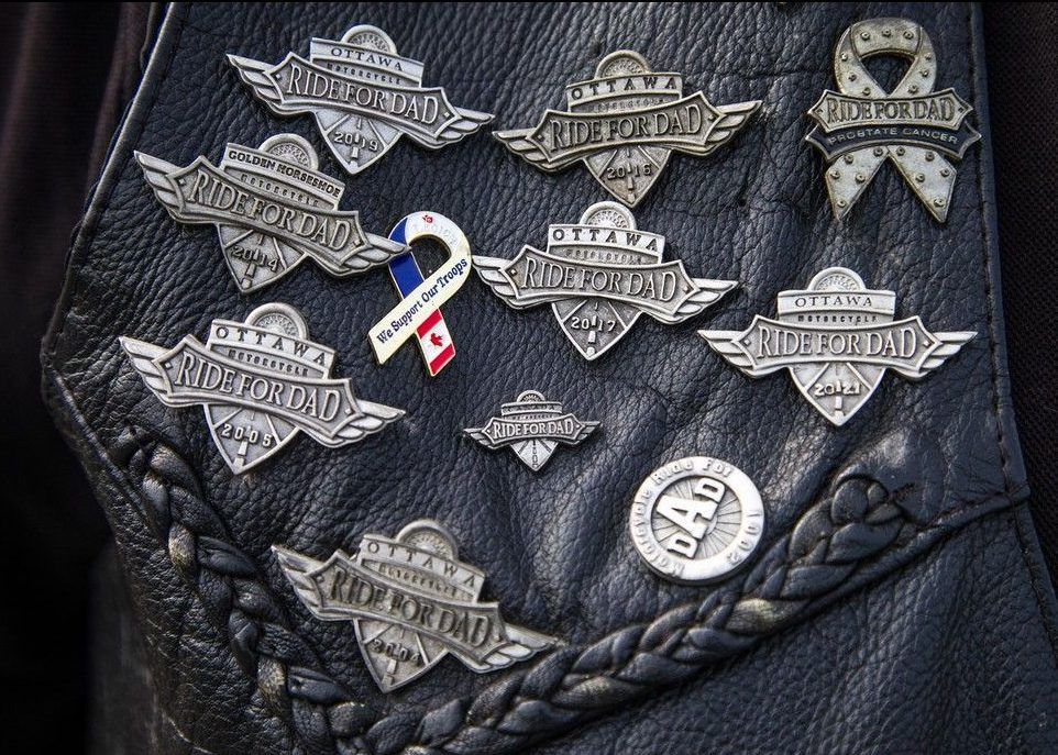  Lothar Bachmann, a Ride for Dad veteran, sports a leather vest covered in buttons.