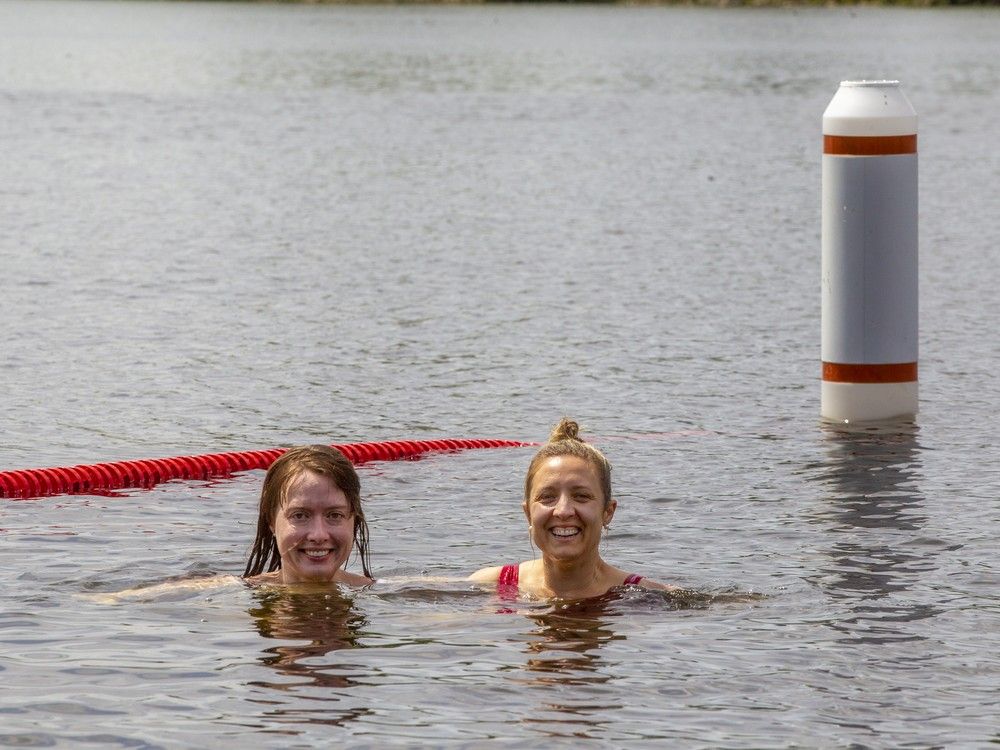  Aubin Calvert and Maggie Thomson enjoy a swim at Dow’s Lake.