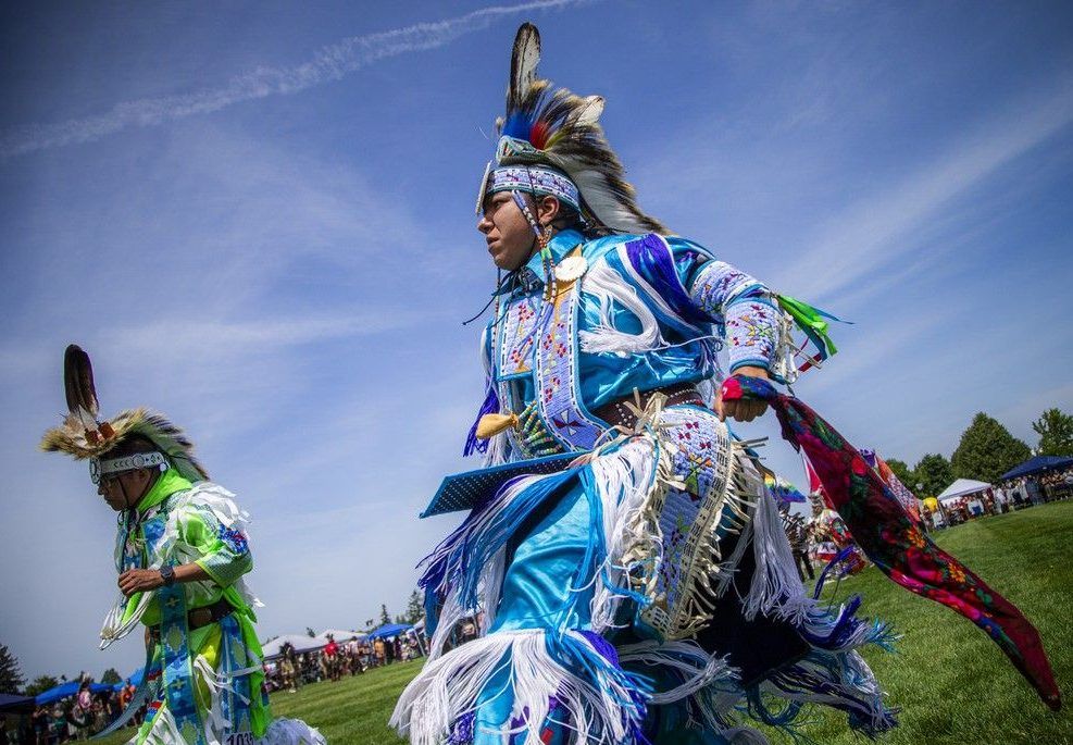  Dancers took part in the Grand Entry to begin the powwow Saturday afternoon under the hot sun, their regalia dancing in the wind and shimmering with vibrant, stunning colours.
