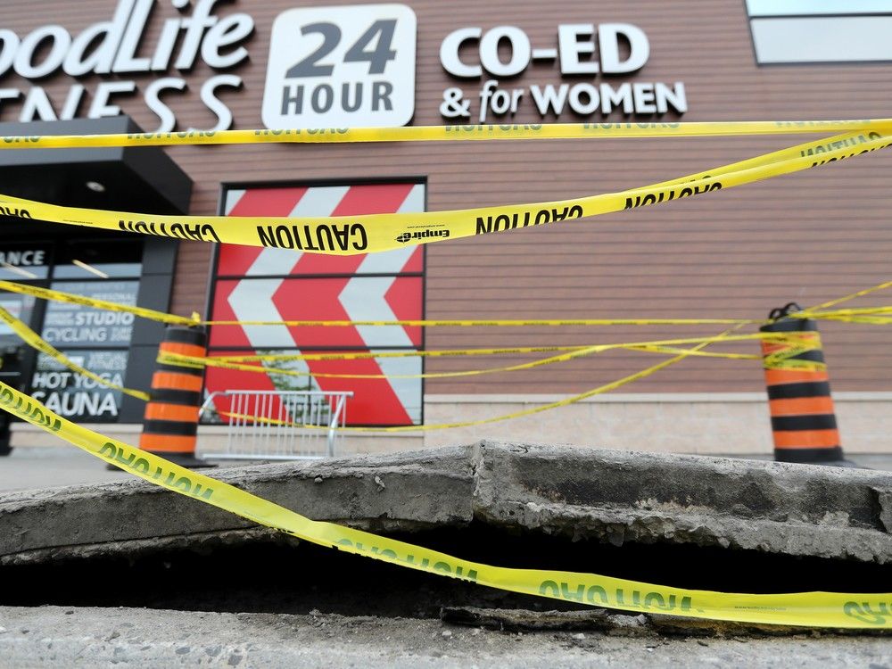  A heaved stretch of sidewalk in front of the Goodlife Fitness at Herongate Mall caused by high heat.