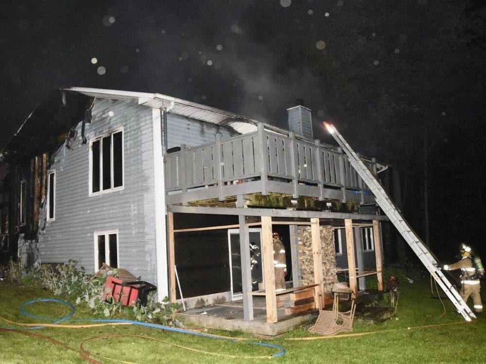  A resident had to jump to safety from the second floor of this home in Constance Bay Tuesday night.