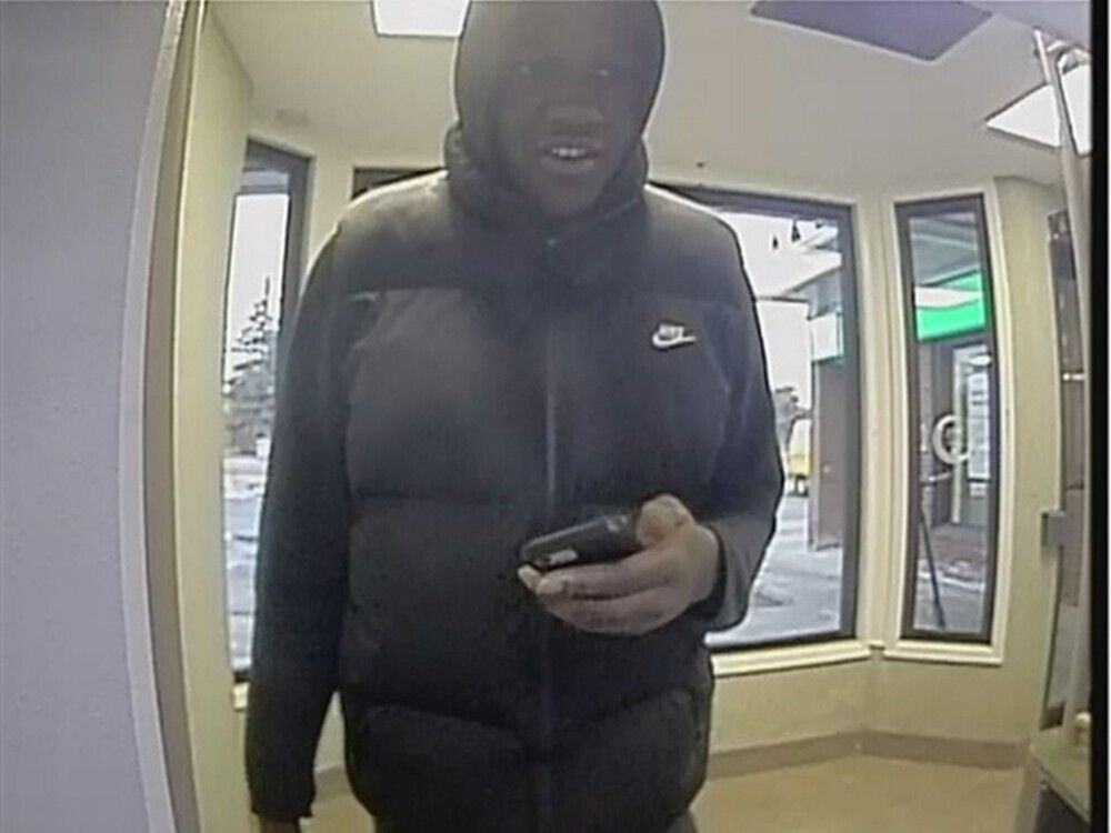  One of the two men sought by the Ottawa Police Service in a ‘bank investigator’ fraud case.