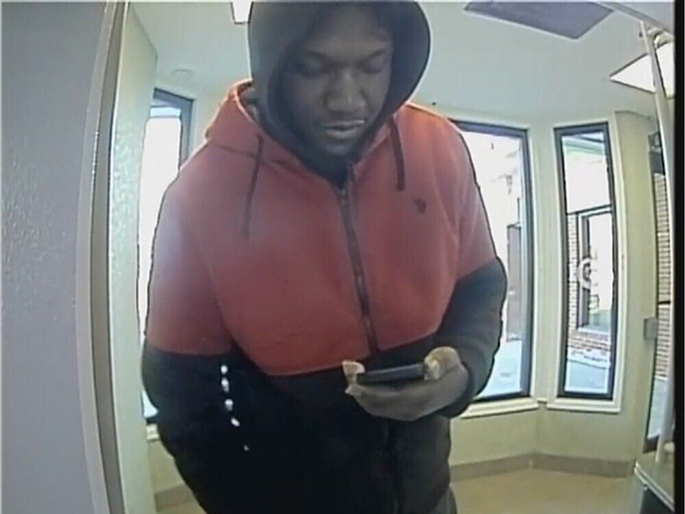  One of the two men sought by the Ottawa Police Service in a ‘bank investigator’ fraud case.