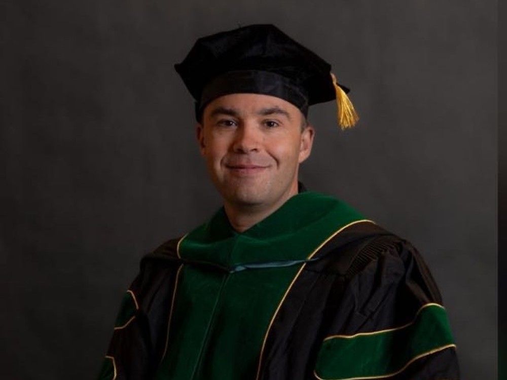 Winnipeg’s Richard Dyrkacz, 41, pictured here at his medical school graduation, applied for a Canadian flag from Parliament Hill this year even though he’s been told the wait list is more than 100 years long. Winnipeg’s Richard Dyrkacz, 41, pictured here at his medical school graduation, applied for a Canadian flag from Parliament Hill this year even though he’s been told the wait list is more than 100 years long.