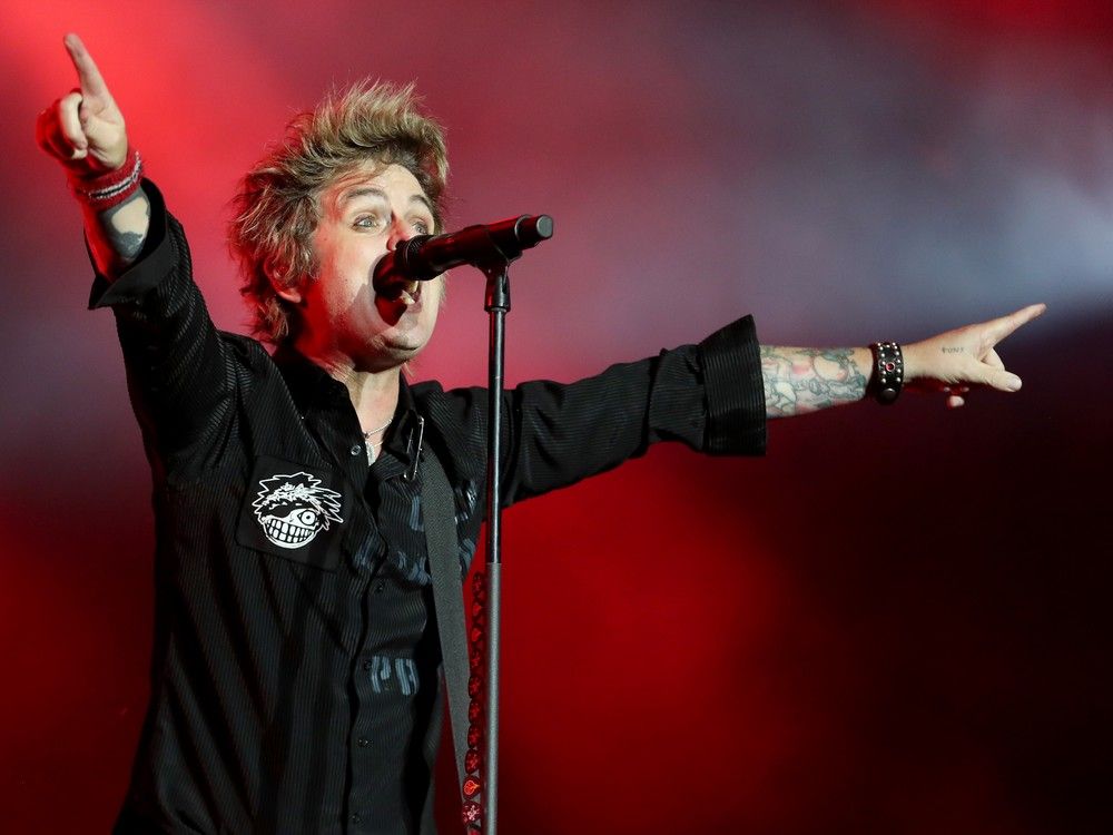OTTAWA. JULY 18,2025 #141760
Green Day headlined Bluesfest Friday night. Here, lead vocalist and guitarist Billy Joe Armstrong enthralls the capacity crowd of fans. 
Photo by JULIE OLIVER/Postmedia
