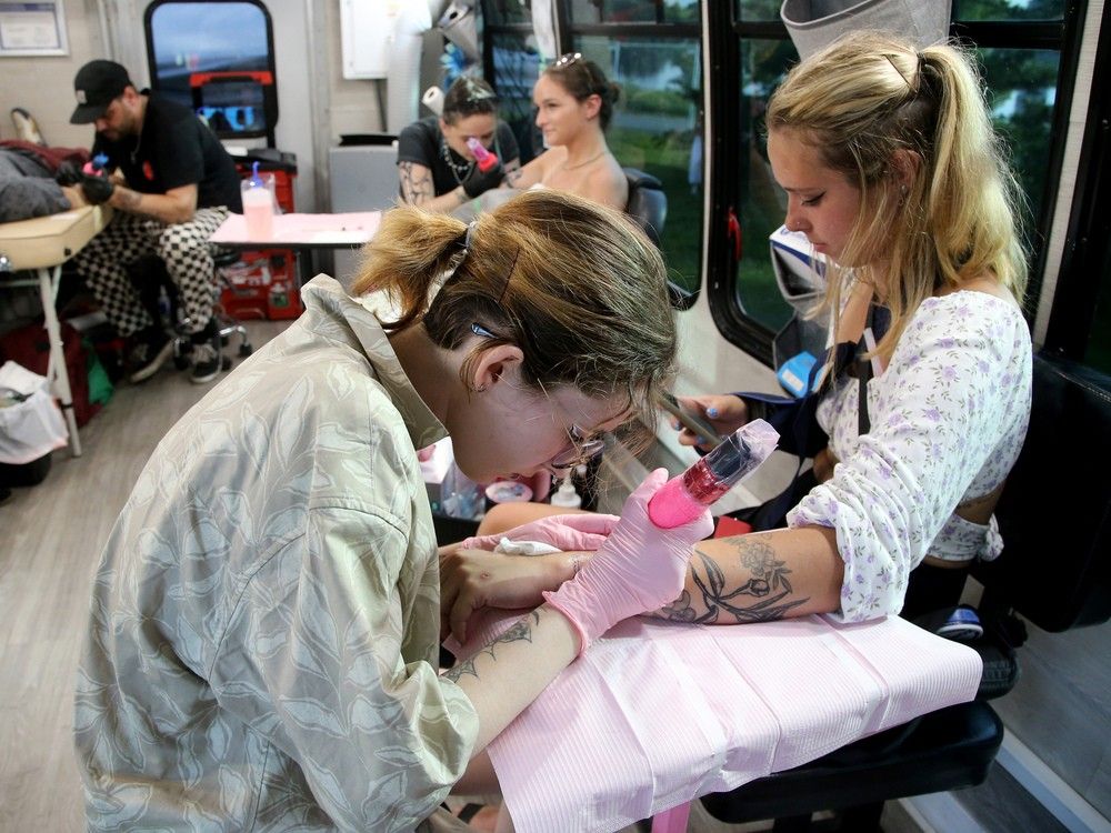  It was busy inside the tattoo truck on site at Bluesfest on Friday evening.