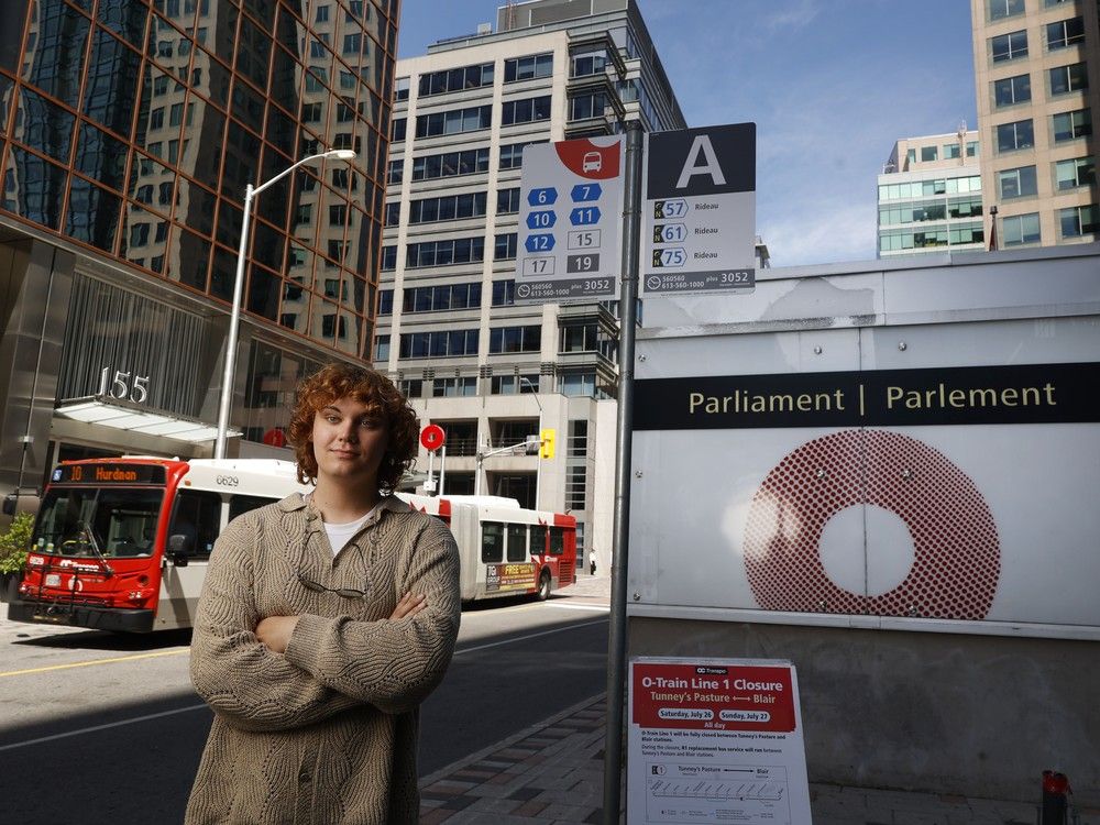  Maeve Villeneuve-Elson poses for a photo at the Parliament bus stop in Ottawa Wednesday. Maeve commutes from Stittsville to downtown Ottawa for a summer job every day, and the trip takes about an hour and a half one way.