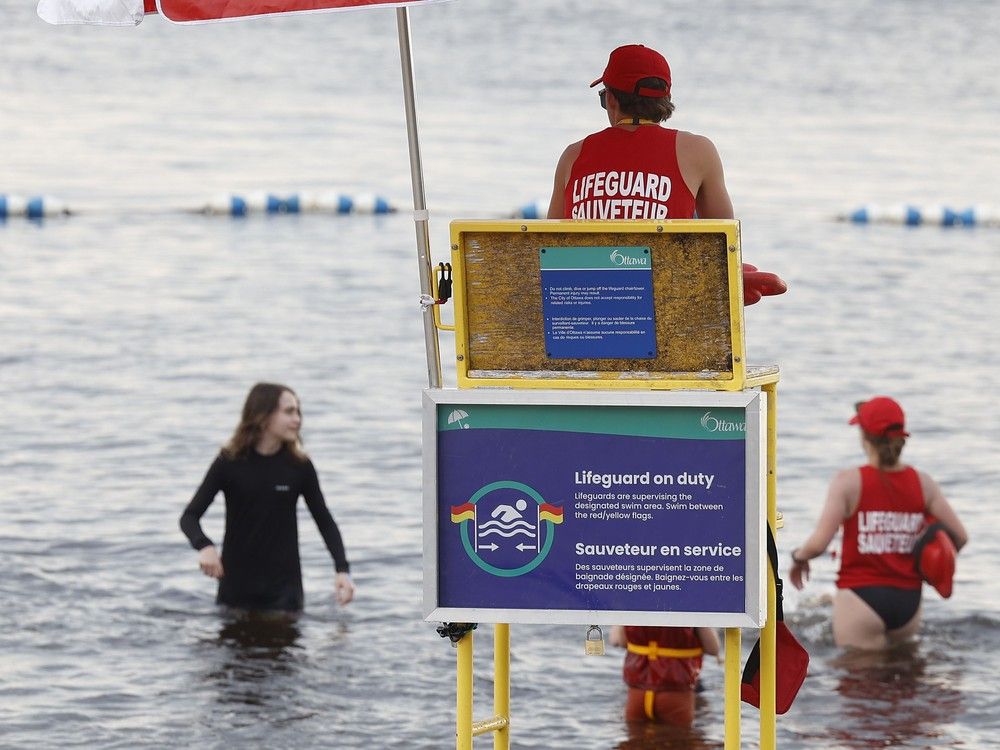 Emergency responders were called to the beach at about 1:40 p.m. after reports that the two were in trouble.