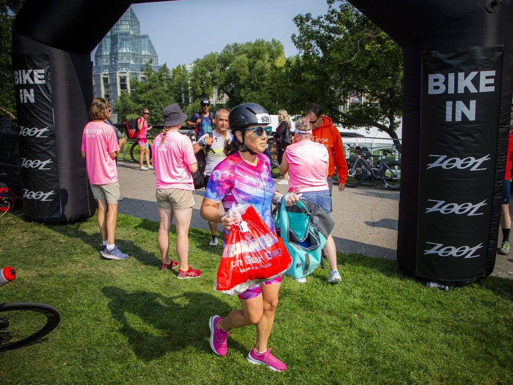  Athletes drop off their running gear in Major’s Hill Park on Saturday morning ahead of the first Ironman triathlon to be held in Ottawa on Sunday.