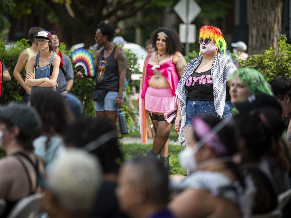  A group gathered in Minto Park on Saturday before marching onto Elgin Street for the annual Dyke March.