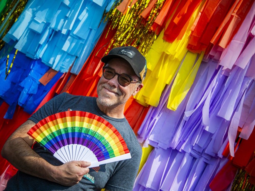  Richard Martin posed at a colourful Photo Booth with his pride fan on the toasty hot afternoon. People walk down Bank Street taking in Capital Pride’s Street Festival, a celebration of 2SLGBTQIA+ communities featuring local vendors, community groups, and inclusive programming.