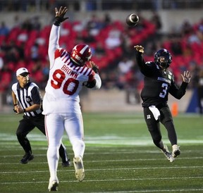 Ottawa Redblacks quarterback Dru Brown (3) throws a touchdown pass