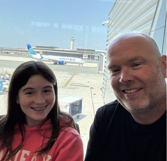  Taylor and Jeff Downie pictured during a stopover in Newark, N.J., on Friday.