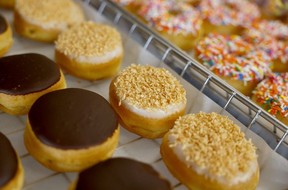 Donuts lined on trays
