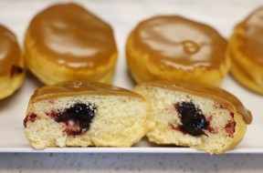 a stuffed donut cut in half