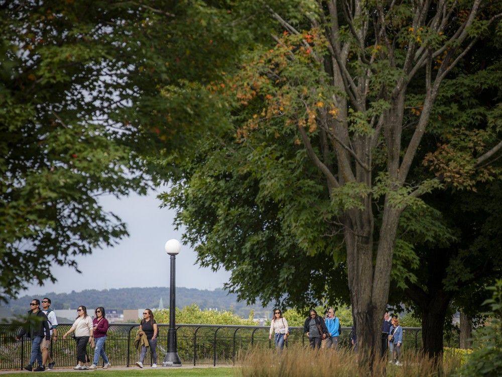  Visitors cross through Major’s Hill Park on Saturday to take in the Open NCC event.