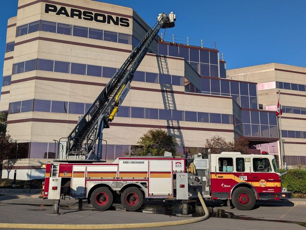  Ottawa fire crews battled flames on the roof of a commercial highrise on Monday, Sept. 29, 2025.