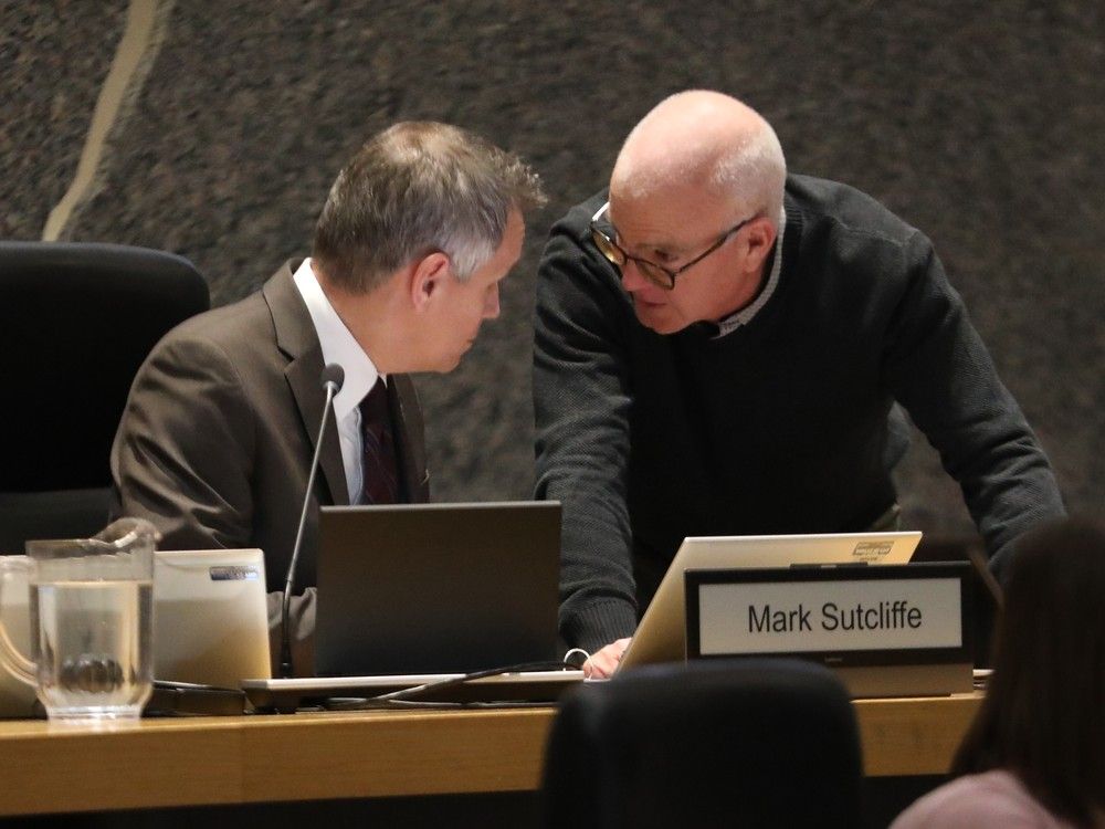 Mayor Mark Sutcliffe and Coun. Jeff Leiper talk during the Lansdowne 2.0 discussions during the FCSC special meeting held at Ottawa City Hall.  Mayor Mark Sutcliffe and Coun. Jeff Leiper talk during the Lansdowne 2.0 discussions during the FCSC special meeting held at Ottawa City Hall.