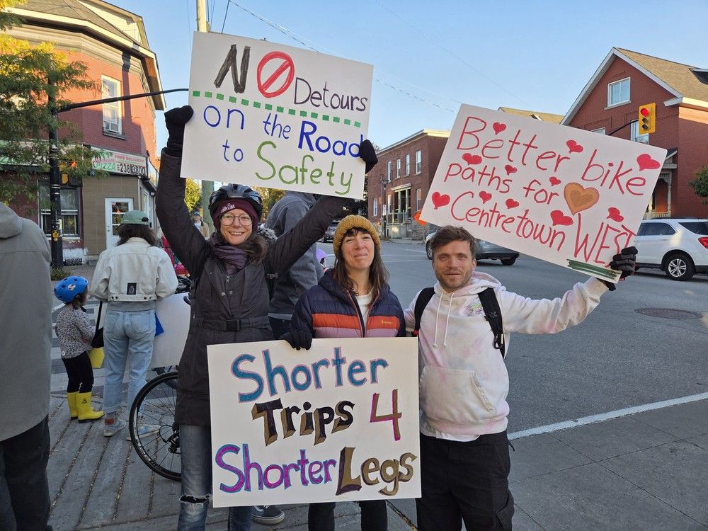  Cyclists rally for safer bike infrastructure along the Gladstone corridor at the intersection of Bronson Avenue and Christie Street on Thursday, Oct. 9, 2025.