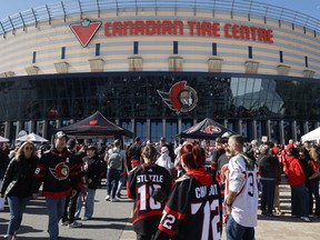Sens fans enjoying the nice weather outside Canadian Tire Centre before the Ottawa Senators' home opener Monday.