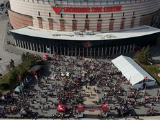 Sens fans enjoying the nice weather outside Canadian Tire Centre before the home opener Monday.