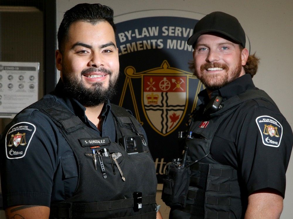  Ottawa bylaw enforcement officers Sebastian Gonzalez, left, and Brayden St. Germain will be among those honoured by the city on Thursday, Oct. 9.
