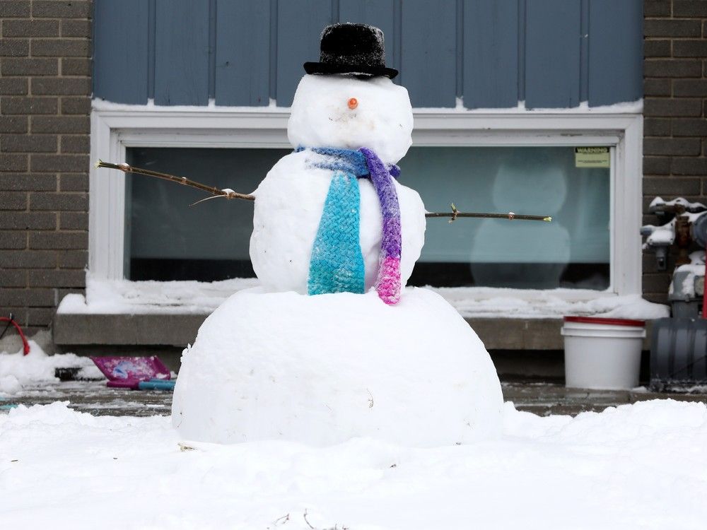  The first snowfall of the season was significant enough to make a snowman like this one found on Marie Street.