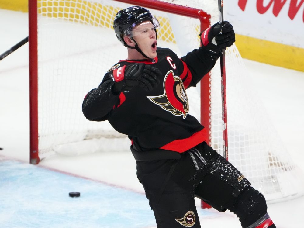 ottawa senators captain brady tkachuk celebrates a goal against the dallas stars.