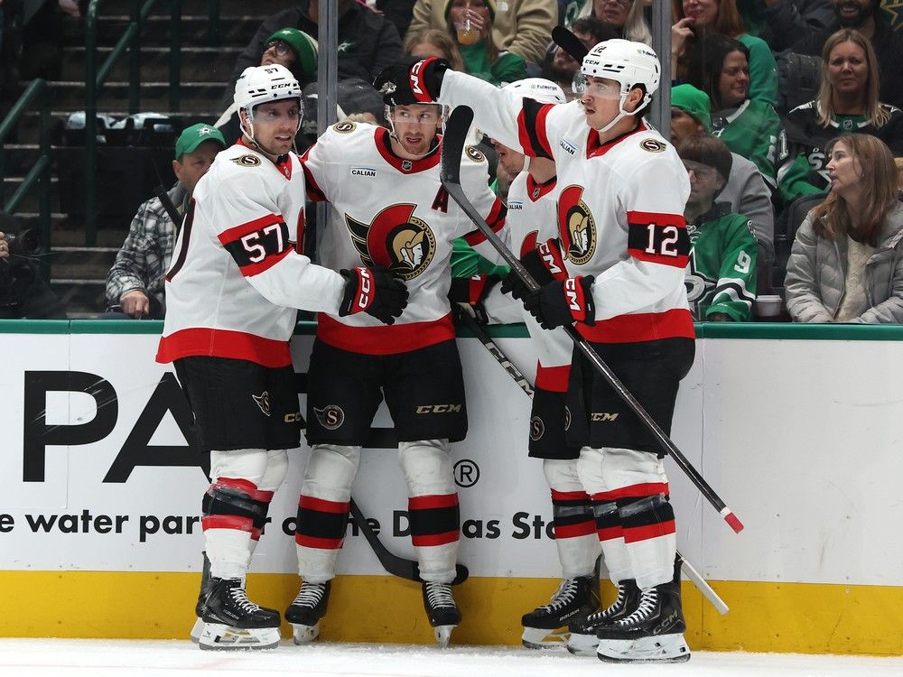  jake sanderson of the ottawa senators celebrates with teammates after scoring a goal during the second period against the dallas stars at american airlines center on sunday, nov. 30, 2025, in dallas.