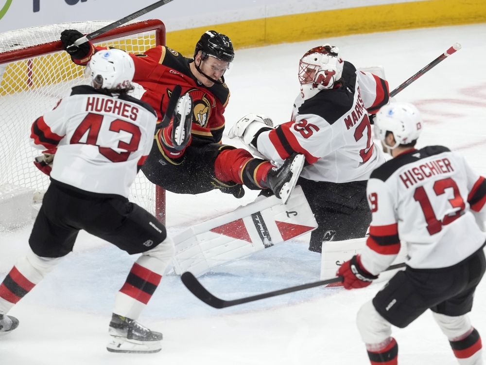 ottawa senators captain brady tkachuk is sent flying in the new jersey devils crease during tuesday’s game.