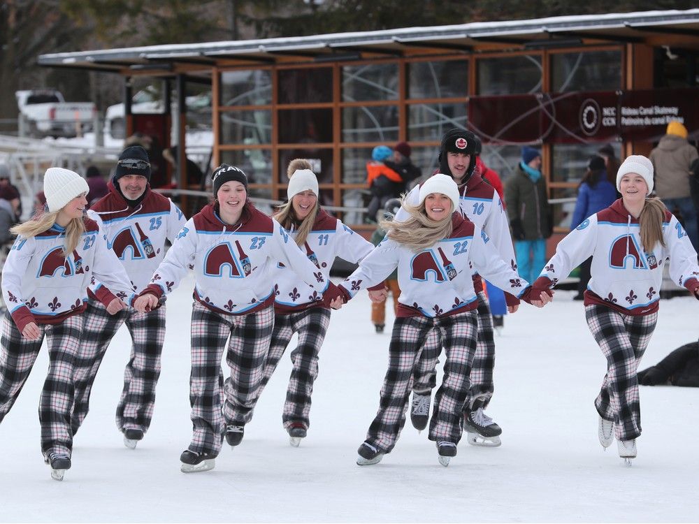  The Paquet family from Quebec described their first time on the Rideau Canal skateway as a “dream come true.” All five kids of Mario Paquet (rear, left) and his wife Patricia Bluteau (rear, centre) grew up skating on their backyard rink and dreamed of skating the canal one day. Hence, the matching pajama bottoms and celebratory jerseys. Their kids include (from left, at front): Samia, Emmie, Gaele, Liamm (right, rear) and Megan Paquet.