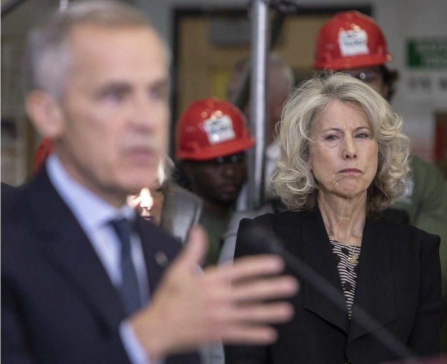 The head of the new federal government Major Projects Office Dawn Farrell listens as Prime Minister Mark Carney announces five major projects in September. Photo by Amber Bracken/The Canadian Press