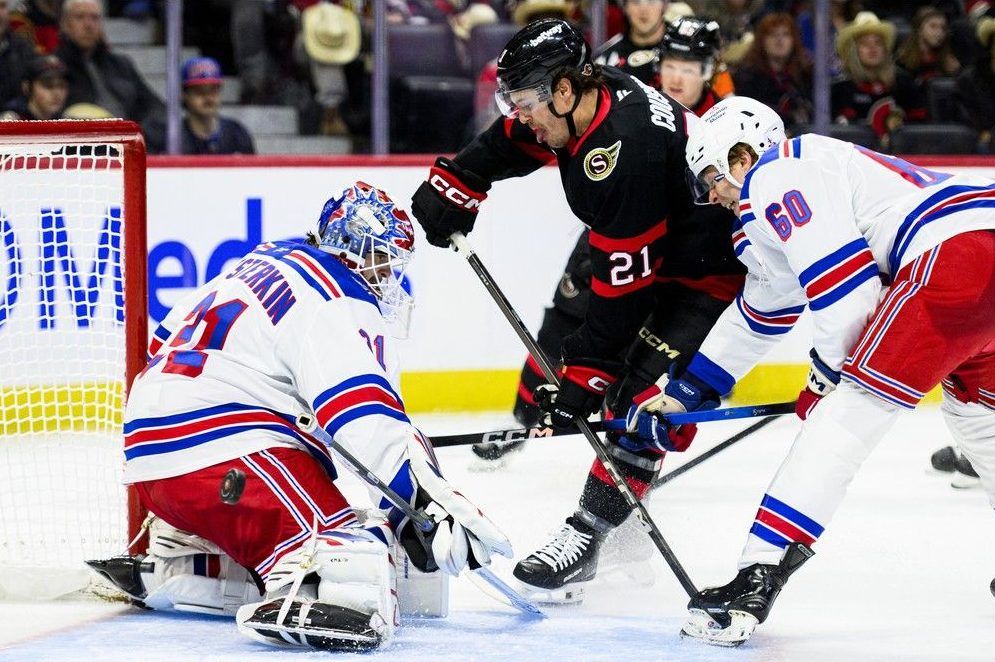  new york rangers goaltender igor shesterkin makes a save on senators forward nick cousins as rangers blueliner scott morrow defends during an nhl game in ottawa on dec. 4, 2025. cousins says he takes pride in going to the front of the net.