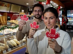 Nicolas Bonnet and his sister Chloe Bonnet hold up Jonas Brothers cookies, which were selling like hotcakes at their parent’s bakery/deli, Le Moulin de Provence, in the Byward Market Monday.