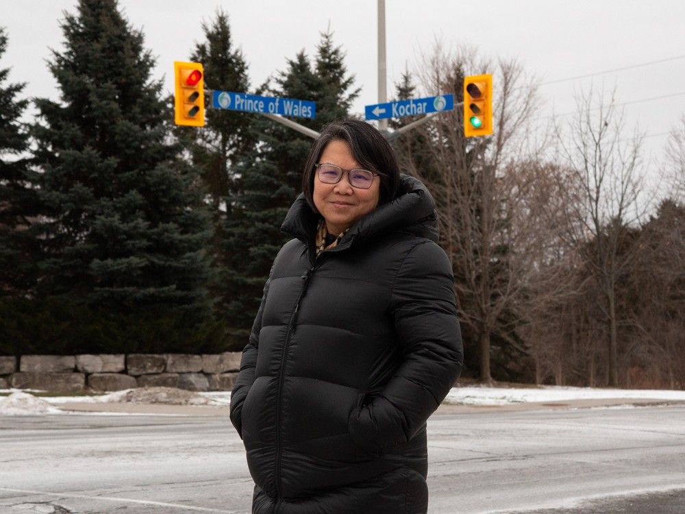  Viola Hoo near where she got into a car accident last year near Prince of Wales and Kochar drives on Dec. 20, 2025. Hoo said she’s concerned about the pedestrian safety of her neighbourhood and how municipal traffic calming decisions are made.